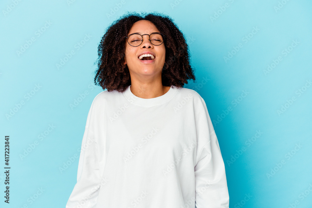 Young african american mixed race woman isolated looking sideways with doubtful and skeptical expression. Young african american mixed race woman isolated looking sideways with doubtful and skeptical expression.