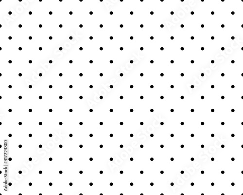 Seamless pattern of black circles on a white background