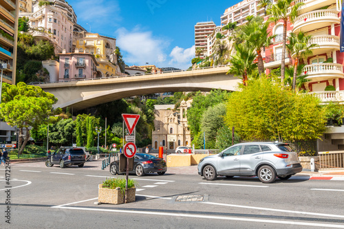 The colorful residential and commercial buildings rise above the streets of Monte Carlo Monaco near Sainte-Devote, part of the F1 grand prix racing circuit. © Kirk Fisher