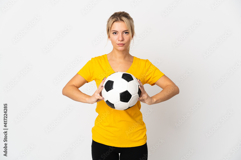 Young Russian woman isolated on white background with soccer ball Young Russian woman isolated on white background with soccer ball