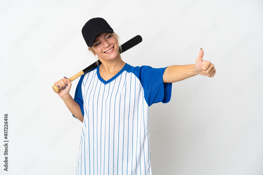 Young Russian woman playing baseball isolated on white background giving a thumbs up gesture