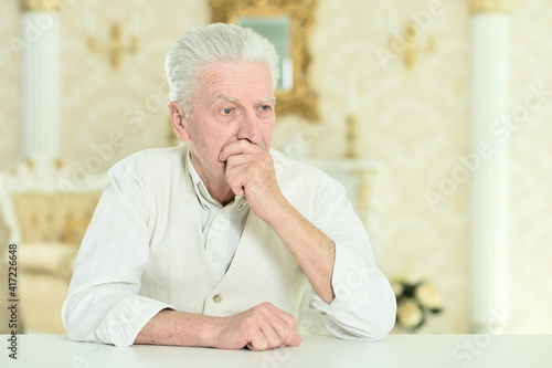 portrait of thoughtful senior man