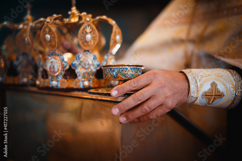 hands of a person with a glass