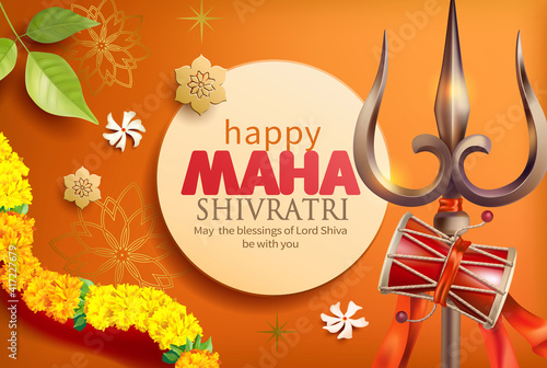 Greeting card with trishula, damru, bilva leaves and floral garland (with zendu flowers) for Maha Shivratri, a Hindu festival celebrated of Lord Shiva. 