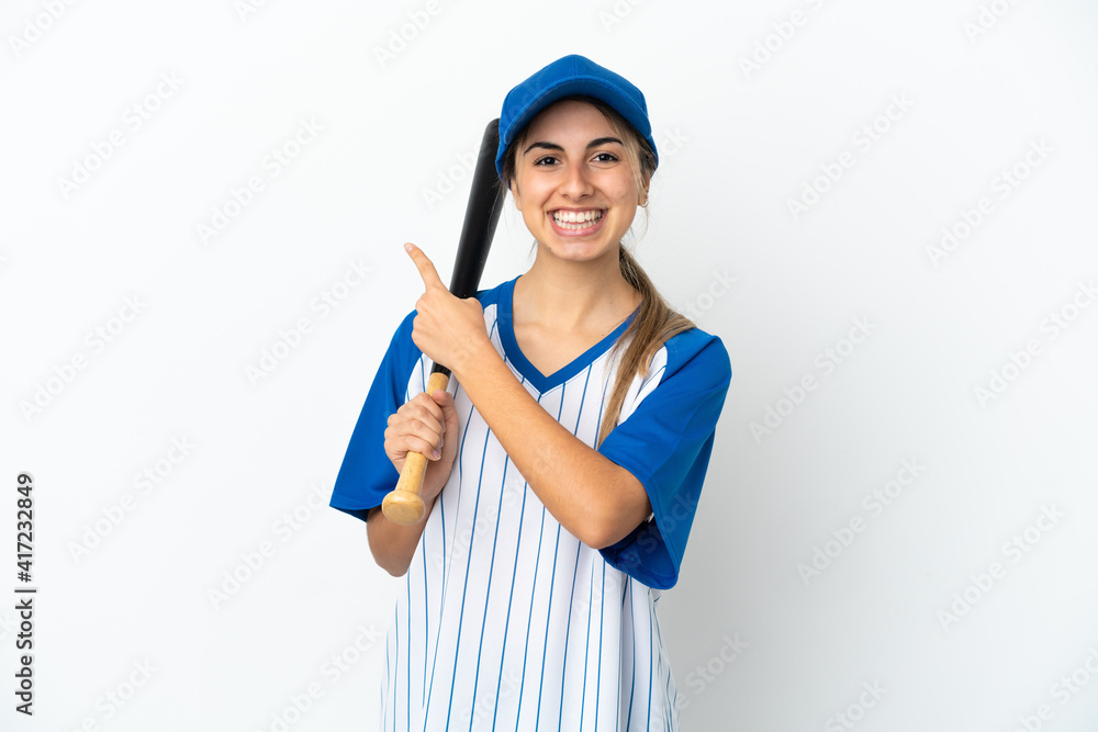 Young caucasian woman playing baseball isolated on white background pointing to the side to present a product Young caucasian woman playing baseball isolated on white background pointing to the side to present a product