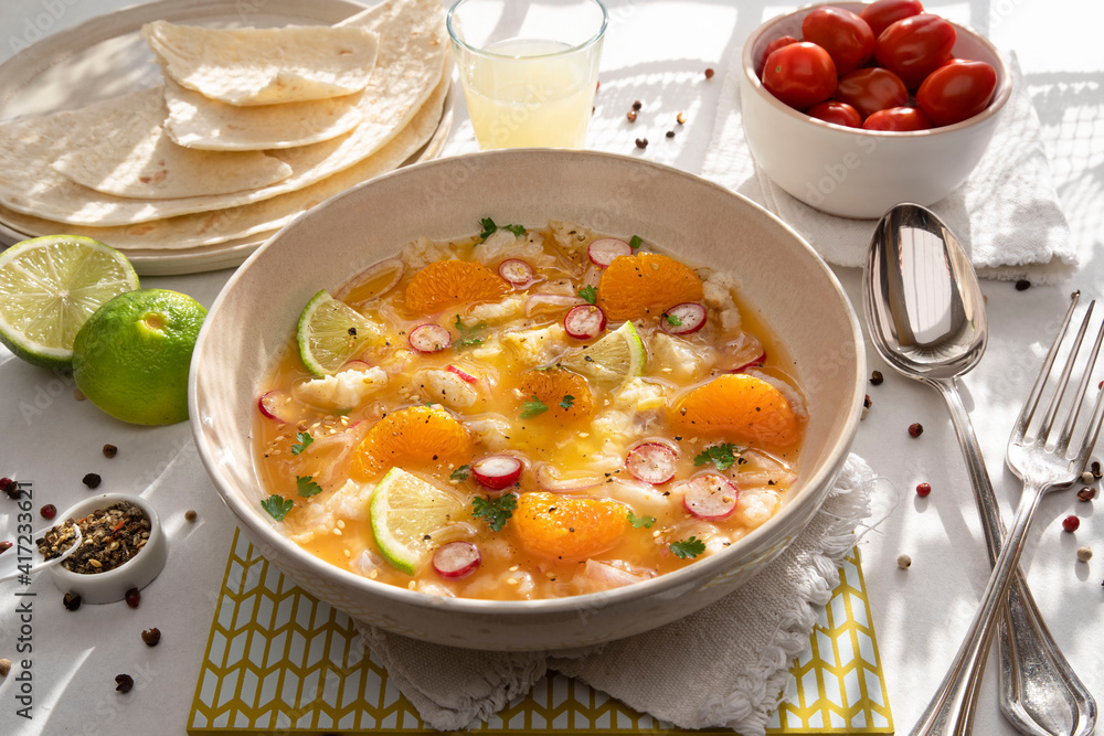 Close-up of a Peruvian ceviche with pieces of fish and citrus fruits Close-up of a Peruvian ceviche with pieces of fish and citrus fruits