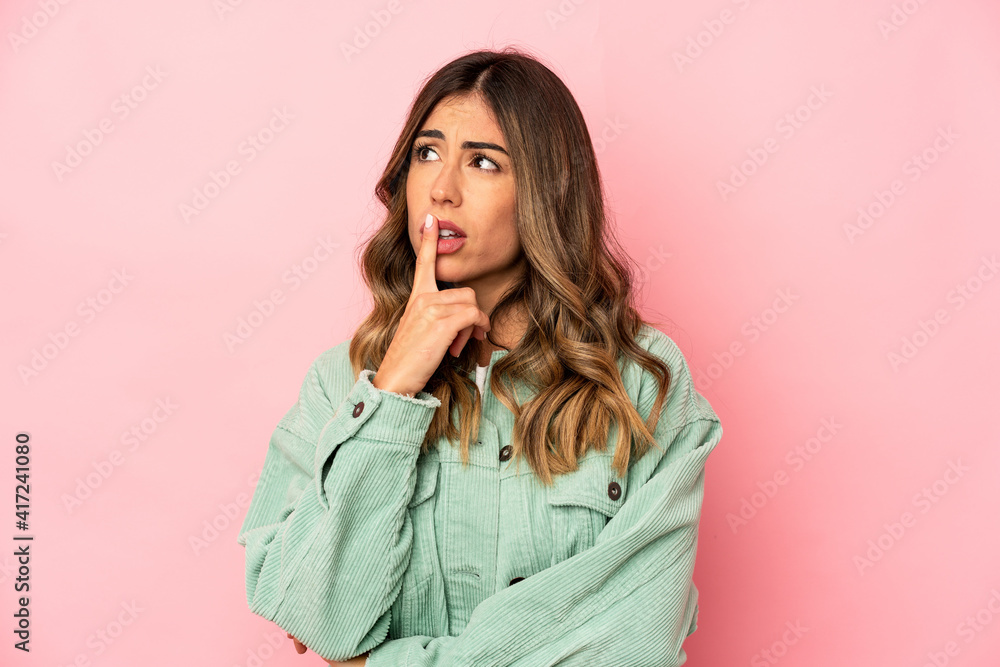 Young caucasian woman isolated looking sideways with doubtful and skeptical expression. Young caucasian woman isolated looking sideways with doubtful and skeptical expression.