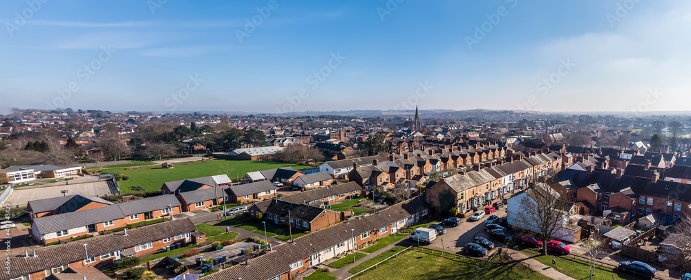A panorama aerial view towards the centre of the town of Market Harborough, UK in springtime