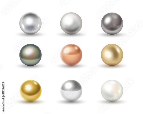 Set of metal balls: golden, chrome, silver, bronze and white 3d spheres isolated