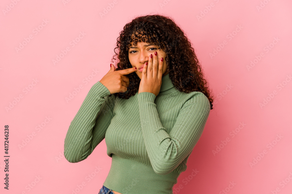 Young african american afro woman isolated having a strong teeth pain, molar ache. Young african american afro woman isolated having a strong teeth pain, molar ache.