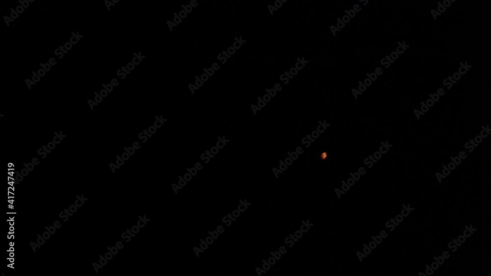 Girl blows out a candle fire in the dark. Woman lips closeup isolated. High quality 4k footage Girl blows out a candle fire in the dark. Woman lips closeup isolated. High quality 4k footage