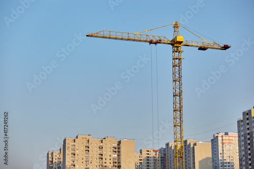 Tower crane building a house