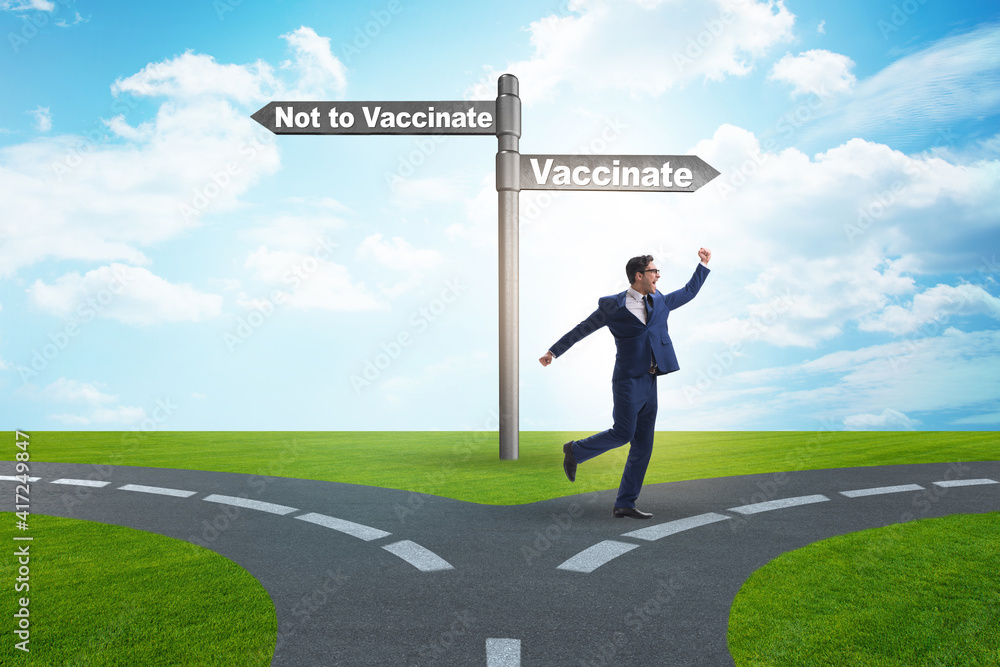 Businessman facing dilemma of vaccination Businessman facing dilemma of vaccination