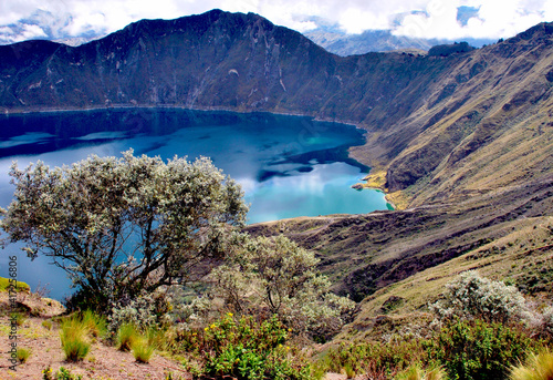 View of a water-filled crater lake and the most western volcano in the Ecuadorian Andes