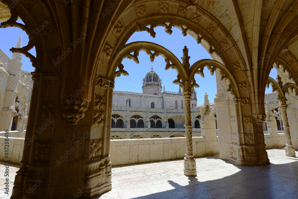 Jeronimos Monastery Cloister with Manueline style in Lisbon, Portugal. Jeronimos Monastery was completed in 1544 and is UNESCO World Heritage Site. 