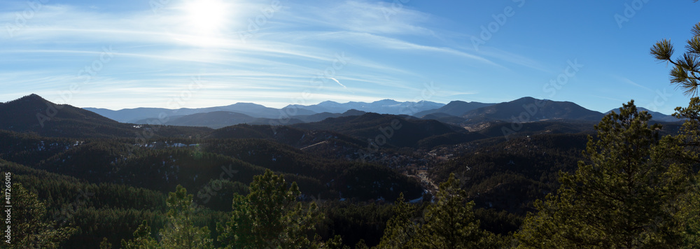 Naklejka premium Blue Skies Over a Mountain View