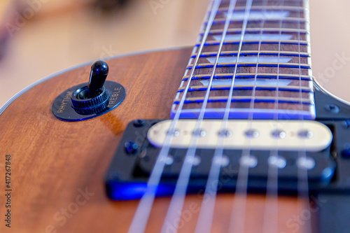 Elements and parts of the electric guitar close-up. Macro. Soft Focus