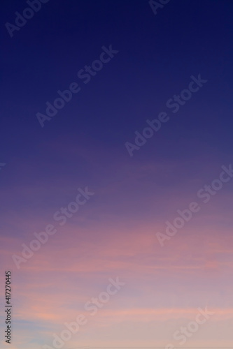 Beautiful morning clear sky background. Colorful yellow blue sky. Morning colorful clear blue sky background with soft white clouds sunrise or sunset.