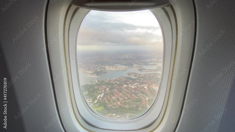 Beautiful cityscape outside the window of airplane, floating on sky. Beautiful cityscape outside the window of airplane, floating on sky.