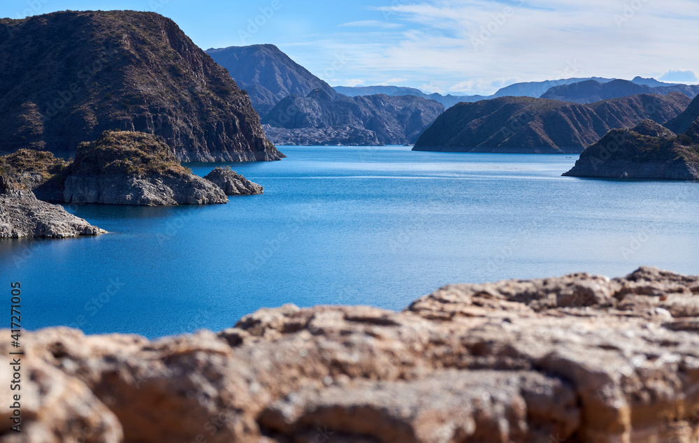 Blue lake with mountains in Valle Grande Mendoza Argentina in summer Blue lake with mountains in Valle Grande Mendoza Argentina in summer