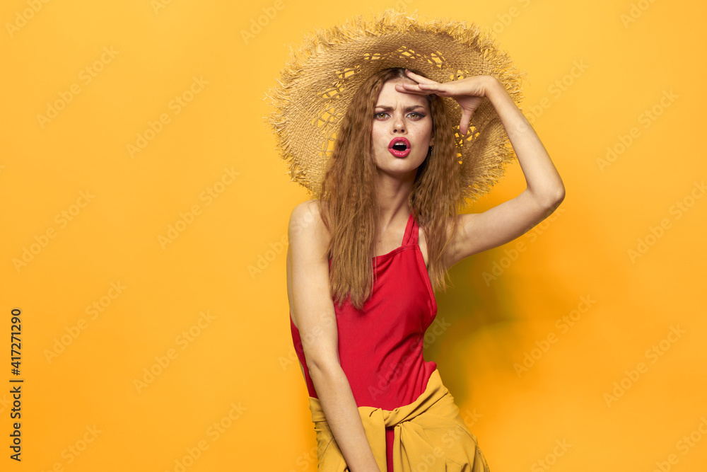 Woman in straw hat bright makeup summer lifestyle fun yellow background Woman in straw hat bright makeup summer lifestyle fun yellow background