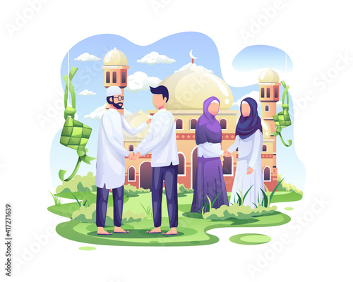 Happy Muslim people celebrate Eid Mubarak by shaking hands in the front of mosque