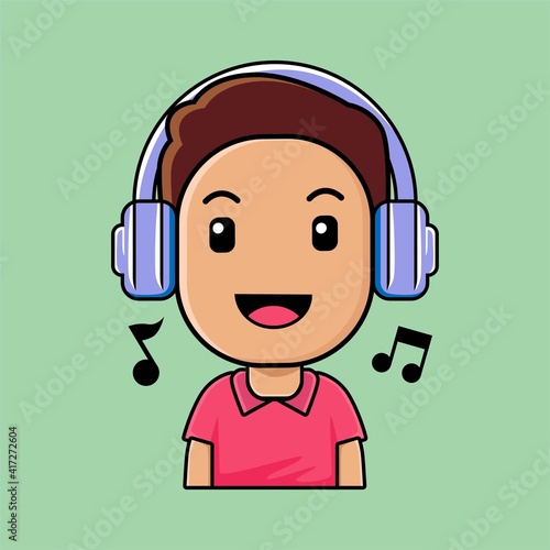 Cute boy wearing headphones listening music