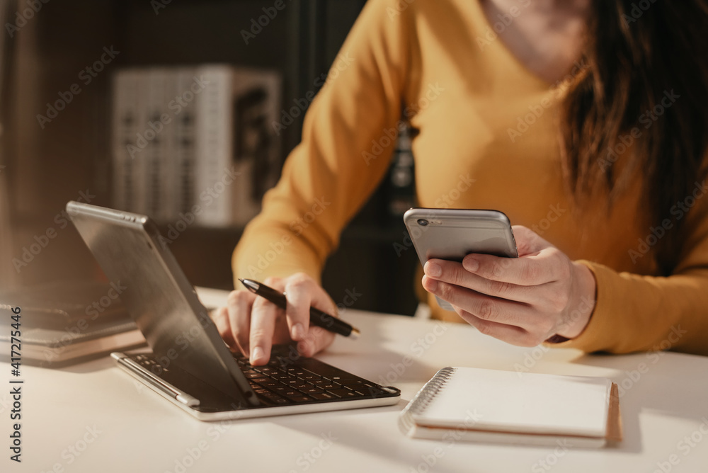 Business concepts, business people working in the work area with smartphones and data sheets at the desk. Business concepts, business people working in the work area with smartphones and data sheets at the desk.