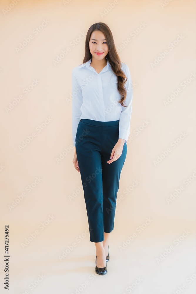Portrait beautiful young asian business woman in action Portrait beautiful young asian business woman in action