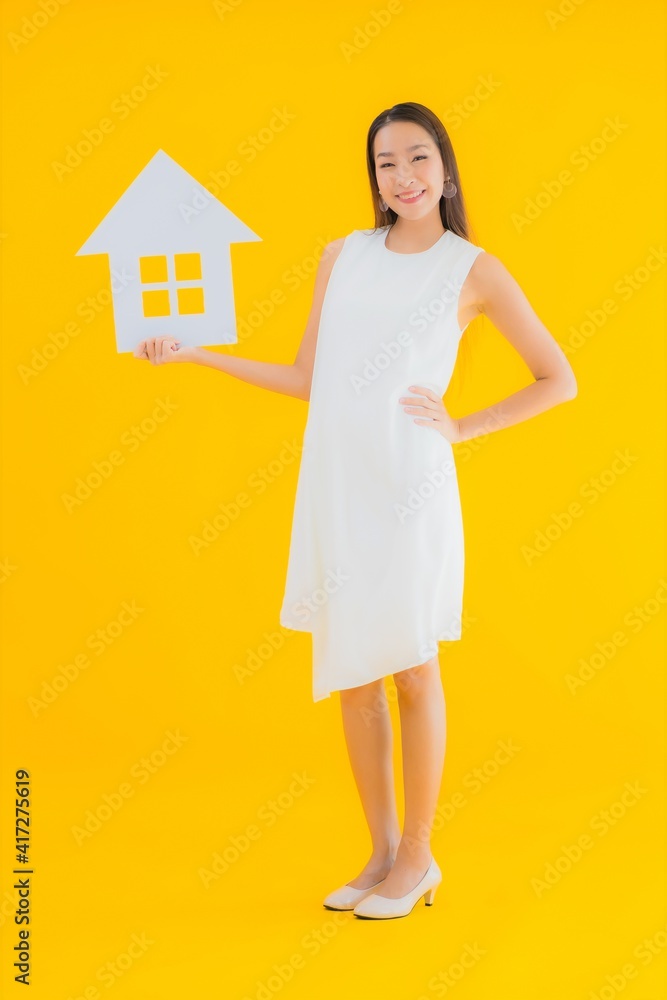 Portrait beautiful young asian woman with house sign paper Portrait beautiful young asian woman with house sign paper
