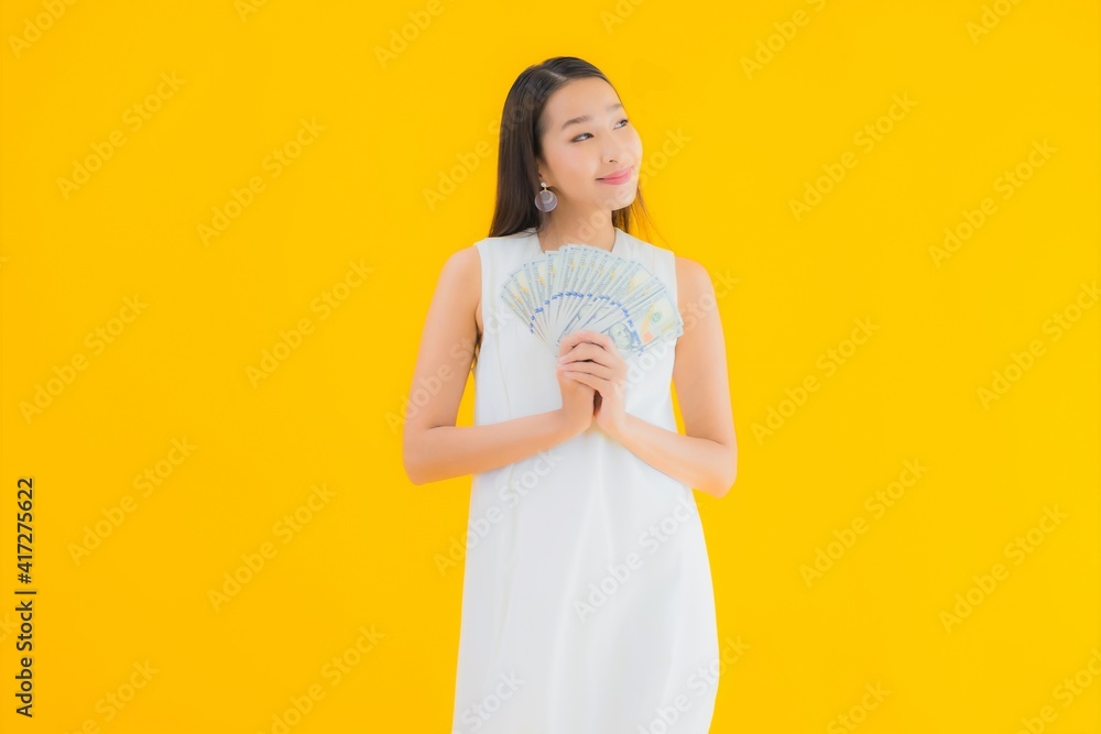 Portrait beautiful young asian woman with money cash Portrait beautiful young asian woman with money cash