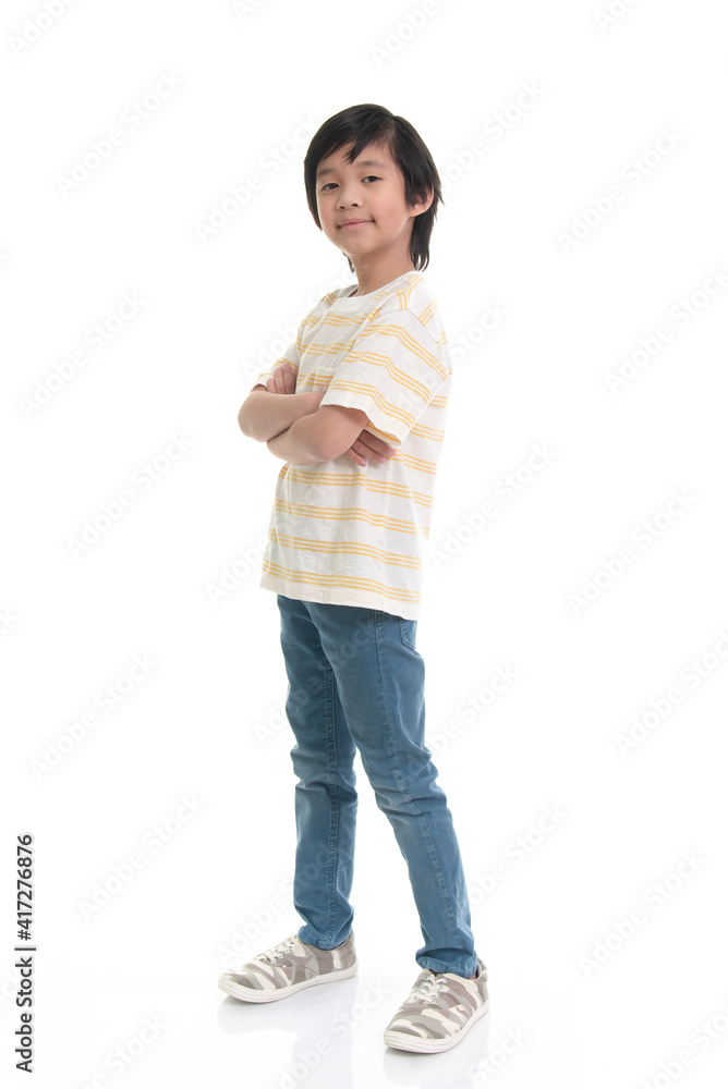 Cute Asian child looking with crossed arms on white background isolated Cute Asian child looking with crossed arms on white background isolated