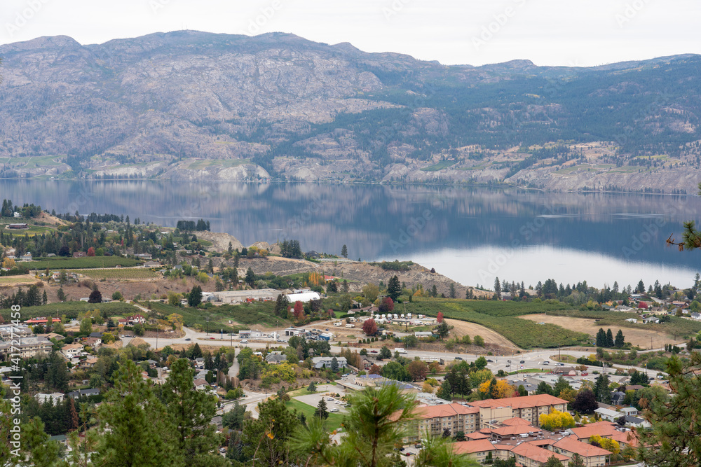 View of the Okanagan Lake on an Autumn Day. Great Reflection in Water.