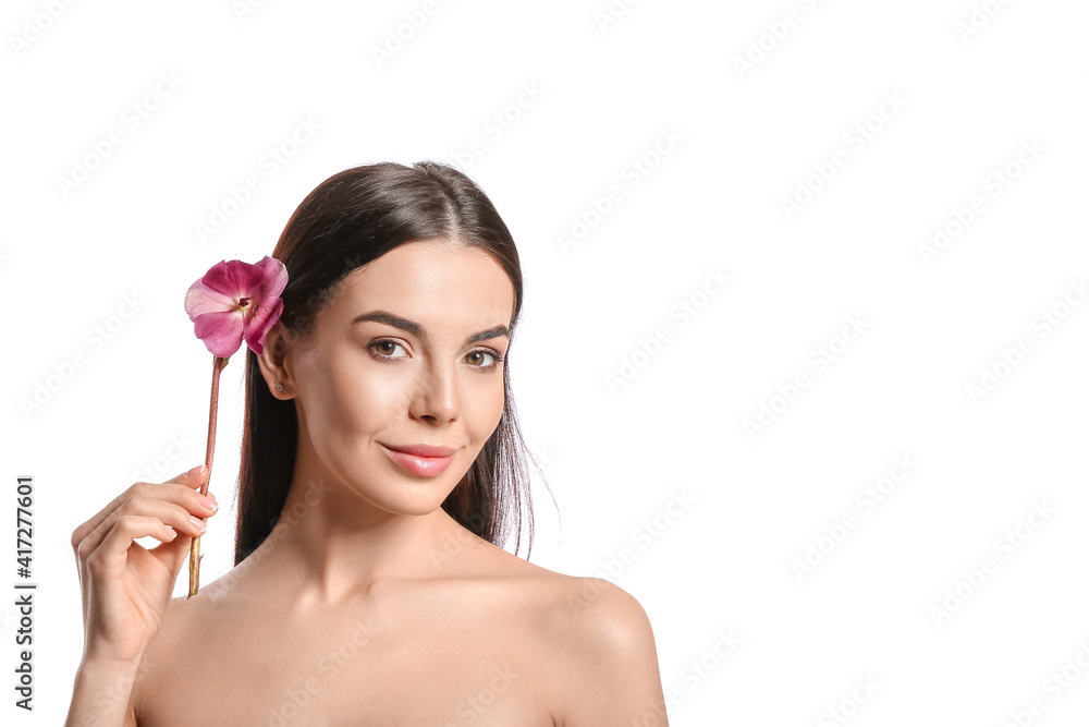 Beautiful young woman with flower on white background Beautiful young woman with flower on white background
