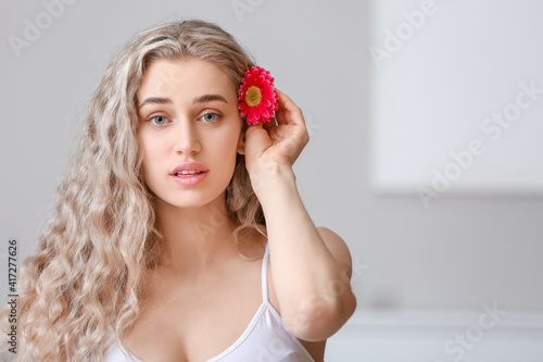 Beautiful young woman with ...