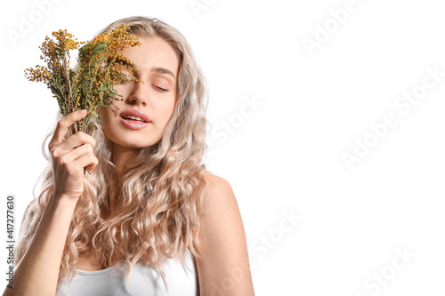 Beautiful young woman with ...