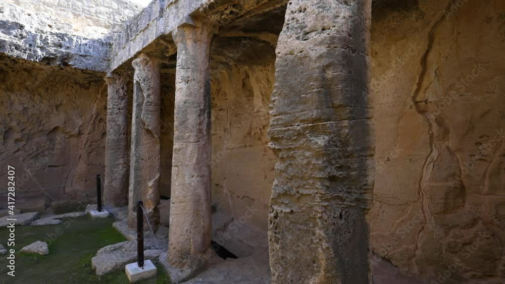 Exterior view of the pillars of the ancient Roman ruins in the Tomb of the Kings in Paphos, Cyprus. Exterior view of the pillars of the ancient Roman ruins in the Tomb of the Kings in Paphos, Cyprus.