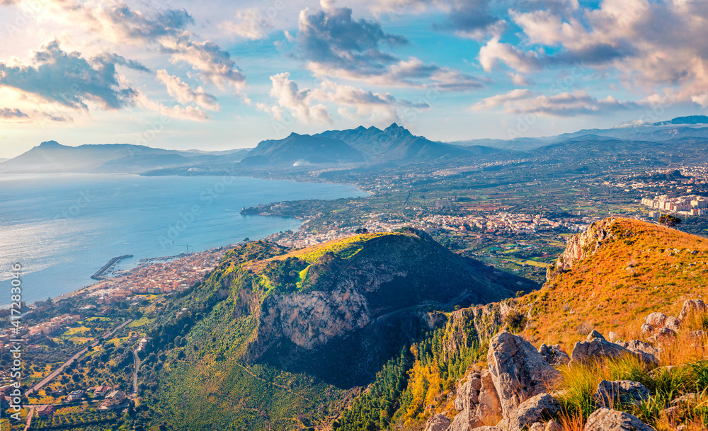Aerial landscape photography. Sunny morning view of Bagheria town and national park Orientata Pizzo Cane. Splendid summer scene of Sicily, Italy. Amazing Mediterranean seascape.