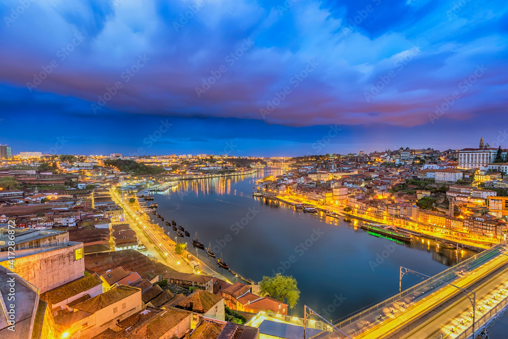 Porto Portugal night city skyline at Porto Ribeira and Douro River and Dom Luis I Bridge