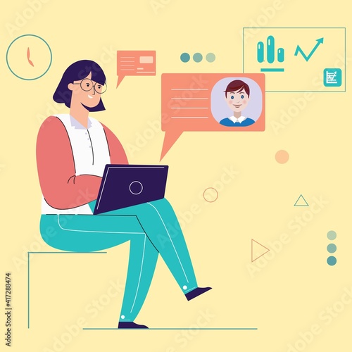 Woman sitting at desk and having a business video call