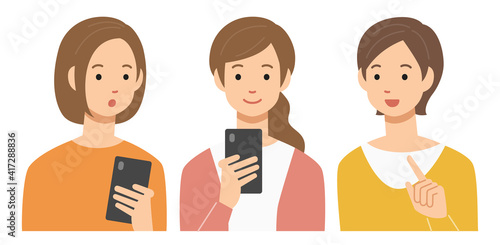 スマホを笑顔で操作する女性たち