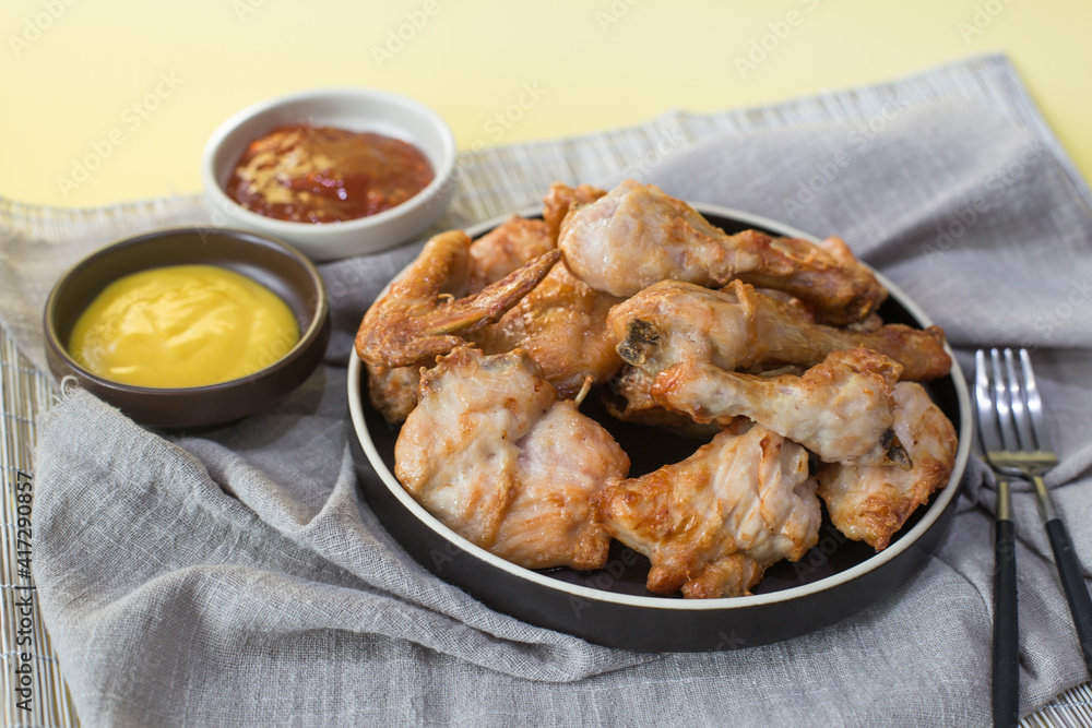 fresh crispy Korean fried chicken with two sources. fresh crispy Korean fried chicken with two sources.