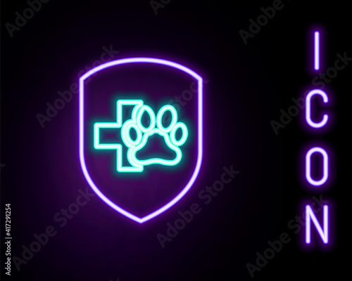 Glowing neon line Animal health insurance icon isolated on black background. Pet protection icon. Dog or cat paw print. Colorful outline concept. Vector.