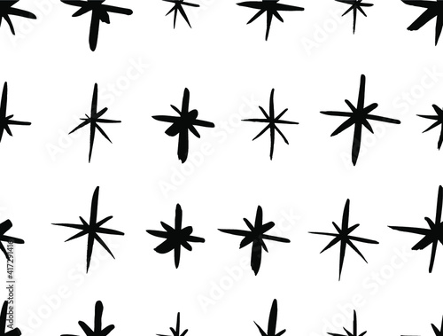 Vector art illustration grunge stars. Set of hand drawn paint object snowflakes for design.  Black and white  shine background. Abstract brush drawing