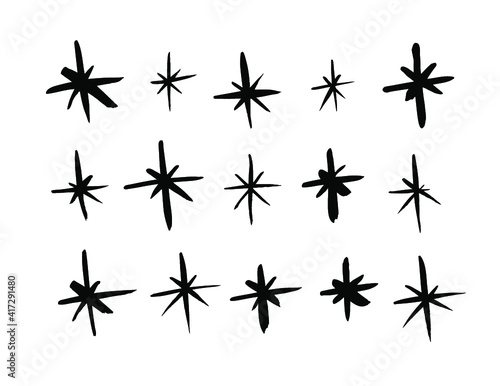 Vector art illustration grunge stars. Set of hand drawn paint object snowflakes for design.  Black and white  shine background. Abstract brush drawing