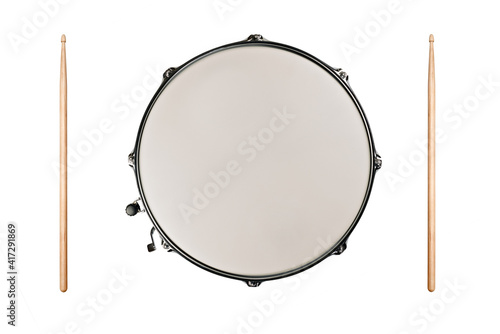 Tableau sur toile top view of a snaredrum and two drumsticks on white background