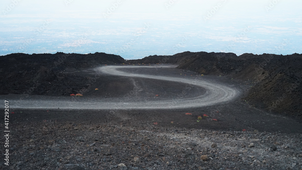 Fototapeta premium Volcanic ash and stones 4wd road like on the moon concept, Etna volcano, Sicily, Italy