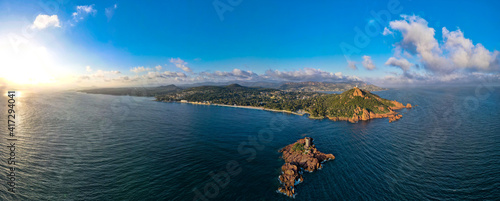 Aerial sunset view of the Cap Dramont with the Esterel coastline in the background at sunset