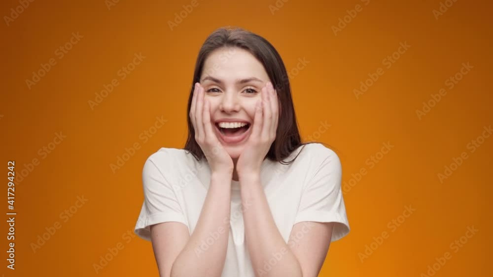 Portrait of woman shocked and surprised with good news Portrait of woman shocked and surprised with good news