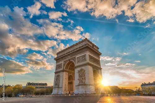 Paris France sunset city skyline at Arc de Triomphe and Champs Elysees photo